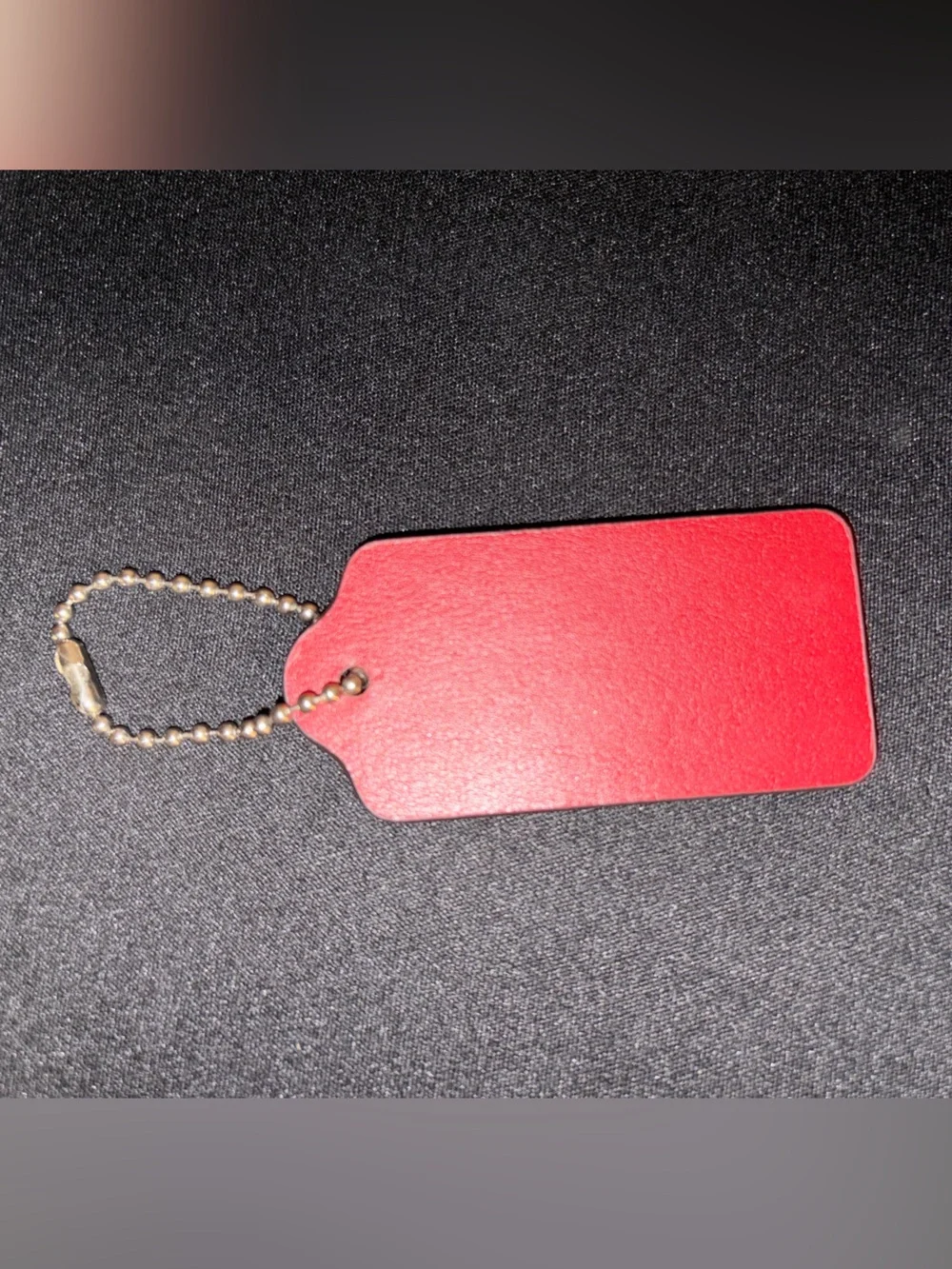 Coach branded red